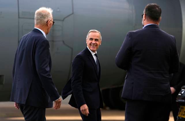September 16, 2026, Manchester, United Kingdom: Prime Minister Mark Carney speaks with Bill Blair, High Commissioner for Canada in the United Kingdom, left, as he arrives in Manchester, England, on Wednesday, Sept. 16, 2026, en route to Liverpool, where he will meet with British Prime Minister Andy Burnham. Manchester United Kingdom  - ZUMAc35_ 20260916_zaf_c35_088 Copyright: xJustinxTangx