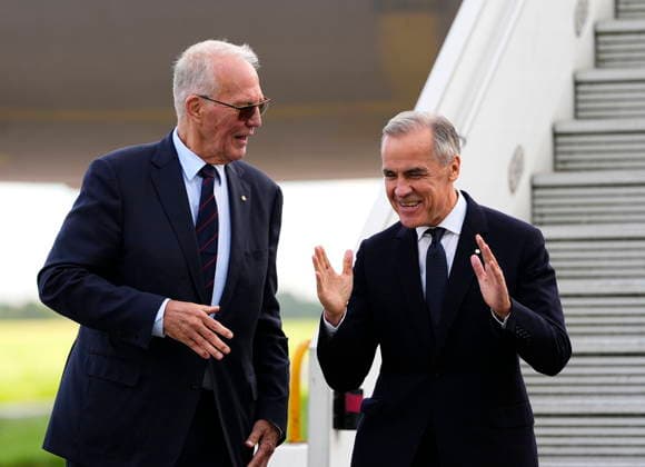 September 16, 2026, Manchester, United Kingdom: Prime Minister Mark Carney, right, is greeted by Bill Blair, High Commissioner for Canada in the United Kingdom as he arrives in Manchester, England, on Wednesday, Sept. 16, 2026, en route to Liverpool, where he will meet with British Prime Minister Andy Burnham. Manchester United Kingdom  - ZUMAc35_ 20260916_zaf_c35_089 Copyright: xJustinxTangx