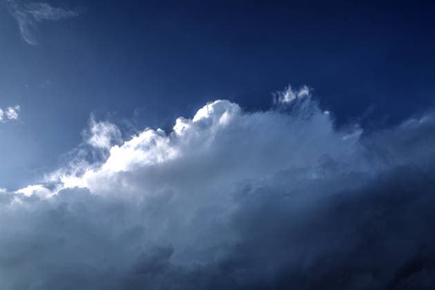 Moments Before a Thunderstorm: A thundercloud appears in all its grandeur and full force shortly after the start of meteorological fall, just a few minutes before a powerful thunderstorm in Essen, North Rhine-Westphalia, Germany