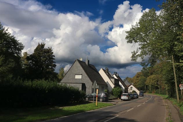 Formation of Large Cumulus Clouds: Massive cloud formations of the vertical cloud type appear in the sky in late summer, bringing scattered rain and, in some cases, thunderstorms. Essen, North Rhine-Westphalia, Germany