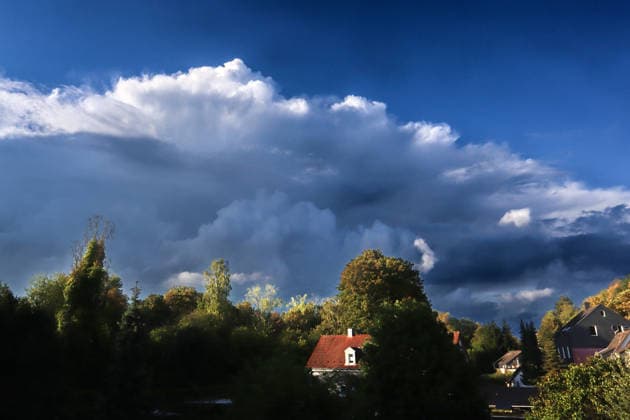 Moments Before a Thunderstorm: A thundercloud appears in all its grandeur and full force shortly after the start of meteorological fall, just a few minutes before a severe thunderstorm in Essen, North Rhine-Westphalia, Germany