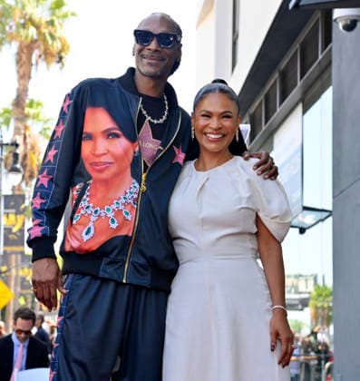 Actress Nia Long is joined by American rapper and actor Snoop Dogg during an unveiling ceremony honoring her with the 2,857th star on the Hollywood Walk of Fame in Los Angeles on Wednesday, September 16, 2026.  LAP2026091613 JIMxRUYMEN