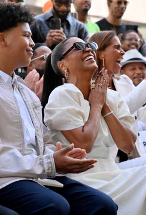 Actress Nia Long reacts to comments as her son Kez Sunday Udoka looks on during an unveiling ceremony honoring Long with the 2,857th star on the Hollywood Walk of Fame in Los Angeles on Wednesday, September 16, 2026.  LAP2026091639 JIMxRUYMEN