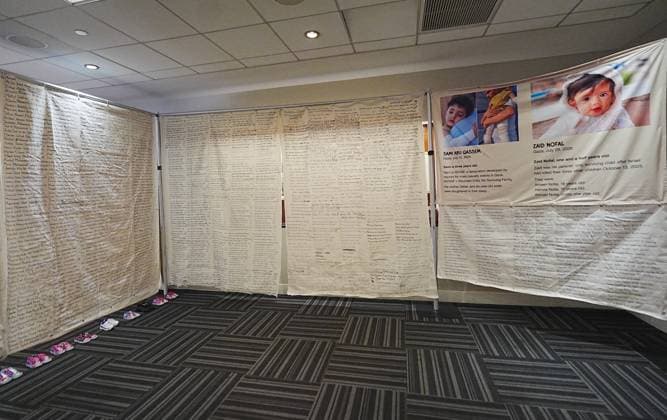 Giant shroud with names of 20,000 Palestinian children displayed in New York NEW YORK, UNITED STATES - SEPTEMBER 16: People attend the commemoration event where a giant shroud, approximately 110 meters long and bearing handwritten names of more than 20,000 children, is displayed at United Nation (UN) Church Center in New York, United States on September 16, 2026. Selcuk Acar Anadolu New York United States. Editorial use only. Please get in touch for any other usage.  Copyright: x2026xAnadoluxSelcukxAcarx