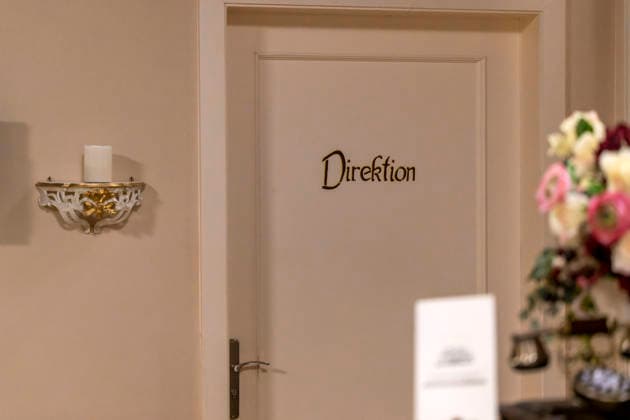 September 16, 2026, ARD telenovela *STURM DER LIEBE*, photo shoot for Season 23 on the film set in Munich, at Bavaria Film in Geiselgasteig, in the studio set of the fictional Hotel Fürstenhof—sign on the door: Management September 16, 2026, ARD series *Sturm der Liebe* September 16, 2026, ARD series *Sturm der Liebe*
