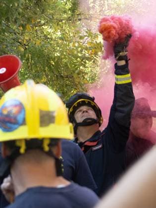 September 17, 2026, Madrid, Madrid, Spain: MADRID, SPAIN - SEPTEMBER 17: A group of wildland firefighters arrive to protest outside the headquarters of the Assembly of Madrid Ã¢â‚¬ the regional parliament of the Community of Madrid Ã¢â‚¬ on September 17, 2026 in Madrid, Spain. The protesters are demanding salary equalization and official recognition of the wildland firefighter job category. Madrid Spain  - ZUMAh199 20260917_zip_h199_002 Copyright: xAaronxHerediax