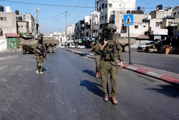 Israeli army continues to raid West Bank NABLUS, WEST BANK, PALESTINE - SEPTEMBER 17 : Israeli soldiers take up positions and maintain security measures during a military raid on the Ain Refugee Camp in Nablus, West Bank, Palestine on September 17, 2026. Israeli forces restricted the movement of local Palestinians during the operation in the refugee camp. Issam Rimawi Anadolu Nablus West Bank. Editorial use only. Please get in touch for any other usage.  Copyright: x2026xAnadoluxIssamxRimawix