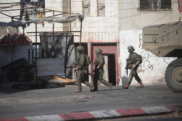 Israeli Forces Deploy During Military Operation Near al-Ain Refugee Camp Israeli armored personnel carriers and soldiers deploy during a military operation at the entrance to al-Ain refugee camp, west of the West Bank city of Nablus, on September 17, 2026. Israeli forces entered the camp and surrounding areas at dawn, raiding homes and restricting movement around the camp, according to Palestinian reports. Photo by Mohammed Nasser apaimages Nablus West Bank Palestinian Territory 170926_Nablus_MN_00(10) Copyright: xapaimagesxMohammedxNasserx xapaimagesx
