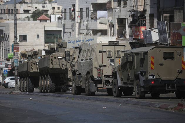 Israeli Forces Deploy During Military Operation Near al-Ain Refugee Camp Israeli armored personnel carriers and soldiers deploy during a military operation at the entrance to al-Ain refugee camp, west of the West Bank city of Nablus, on September 17, 2026. Israeli forces entered the camp and surrounding areas at dawn, raiding homes and restricting movement around the camp, according to Palestinian reports. Photo by Mohammed Nasser apaimages Nablus West Bank Palestinian Territory 170926_Nablus_MN_00(13) Copyright: xapaimagesxMohammedxNasserx xapaimagesx