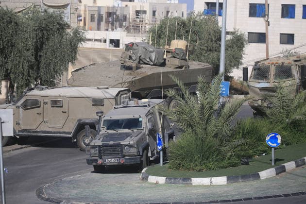 Israeli Forces Deploy During Military Operation Near al-Ain Refugee Camp Israeli armored personnel carriers and soldiers deploy during a military operation at the entrance to al-Ain refugee camp, west of the West Bank city of Nablus, on September 17, 2026. Israeli forces entered the camp and surrounding areas at dawn, raiding homes and restricting movement around the camp, according to Palestinian reports. Photo by Mohammed Nasser apaimages Nablus West Bank Palestinian Territory 170926_Nablus_MN_00(14) Copyright: xapaimagesxMohammedxNasserx xapaimagesx