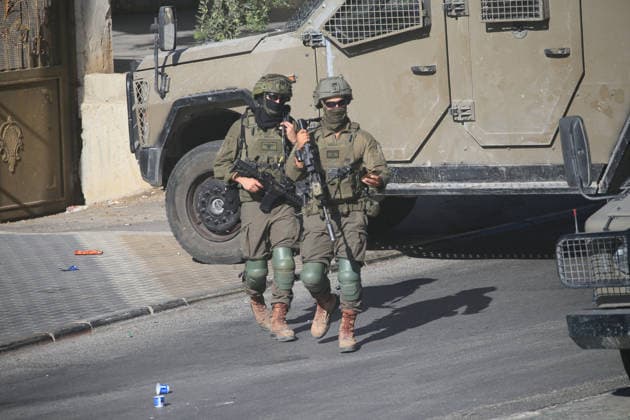 Israeli Forces Deploy During Military Operation Near al-Ain Refugee Camp Israeli armored personnel carriers and soldiers deploy during a military operation at the entrance to al-Ain refugee camp, west of the West Bank city of Nablus, on September 17, 2026. Israeli forces entered the camp and surrounding areas at dawn, raiding homes and restricting movement around the camp, according to Palestinian reports. Photo by Mohammed Nasser apaimages Nablus West Bank Palestinian Territory 170926_Nablus_MN_00(15) Copyright: xapaimagesxMohammedxNasserx xapaimagesx