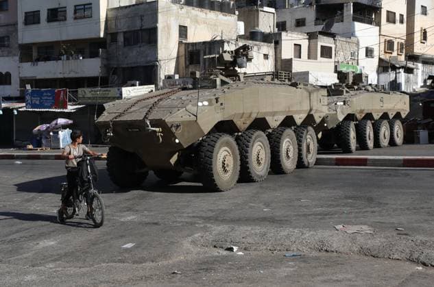 September 17, 2026, Nablus, Palestine, State of: NABLUS, OCCUPIED WEST BANK, SEPTEMBER 17, 2026: Israeli troops move along a street during a military operation in Ein Beit al-Ma refugee camp, west of Nablus in the occupied West Bank. Nablus Palestine, State of - ZUMAq101 20260917_zna_q101_012 Copyright: xNedalxShtiehx