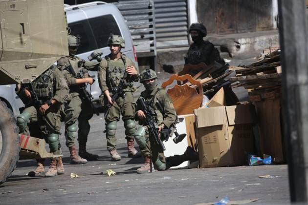 September 17, 2026, Nablus, Palestine, State of: NABLUS, OCCUPIED WEST BANK, SEPTEMBER 17, 2026: Israeli troops move along a street during a military operation in Ein Beit al-Ma refugee camp, west of Nablus in the occupied West Bank. Nablus Palestine, State of - ZUMAq101 20260917_zna_q101_013 Copyright: xNedalxShtiehx