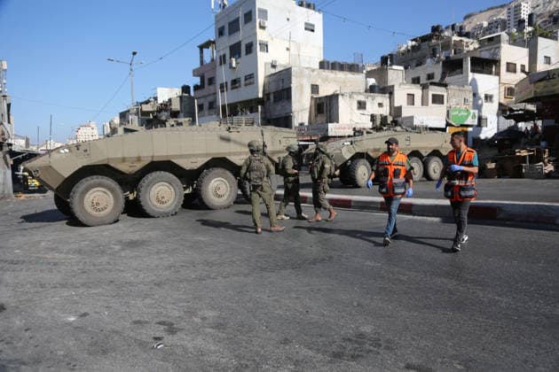 Israeli Forces Deploy During Military Operation Near al-Ain Refugee Camp Israeli armored personnel carriers and soldiers deploy during a military operation at the entrance to al-Ain refugee camp, west of the West Bank city of Nablus, on September 17, 2026. Israeli forces entered the camp and surrounding areas at dawn, raiding homes and restricting movement around the camp, according to Palestinian reports. Photo by Mohammed Nasser apaimages Nablus West Bank Palestinian Territory 170926_Nablus_MN_00(5) Copyright: xapaimagesxMohammedxNasserx xapaimagesx