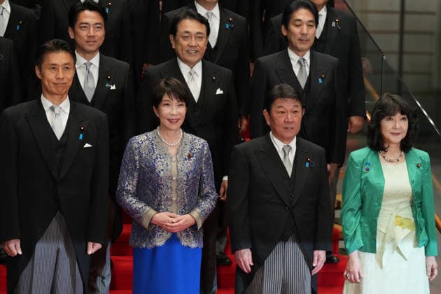 September 17, 2026, Tokyo, Japan: Japan s Prime Minister Sanae Takaichi, front second left, and members of her reshuffled Cabinet, including Defense Minister Shinjiro Koizumi, back from left, Trade Minister Ryosei Akazawa, Growth Strategy Minister Minoru Kiuchi, Reconstruction Minister Goshi Hosono, front from left, Foreign Minister Toshimitsu Motegi and Finance Minister Satsuki Katayama, pose for a photo at the prime minister s office in Tokyo. Tokyo Japan - ZUMAz114 20260917_zih_z114_019 Copyright: xPOOLx