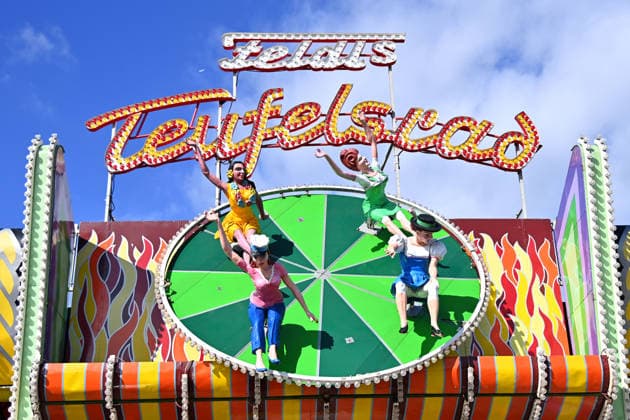 Figures of women, dolls on the Devil s Wheel ride, carnival performers, rides, carnival performers, rides—press tour ahead of the 191st Oktoberfest in 2026 on September 17, 2026