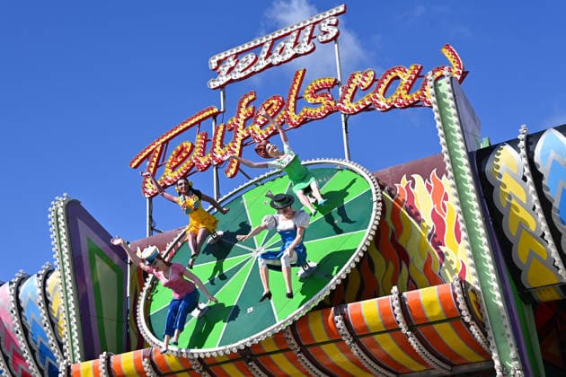 Figures of women, dolls on the Devil s Wheel ride, carnival performers, rides, carnival performers, rides—press tour ahead of the 191st Oktoberfest in 2026 on September 17, 2026