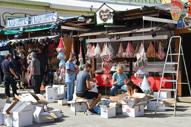 Final preparations at the stands: People unpacking gingerbread hearts in front of the Herzerl Bude Press tour ahead of the 191st Oktoberfest in 2026 on September 17, 2026