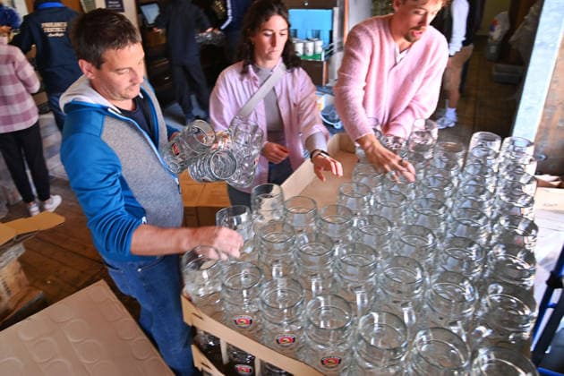 Beer mugs are unpacked and placed on shelves. Press tour ahead of the 191st Oktoberfest 2026 on September 17, 2026