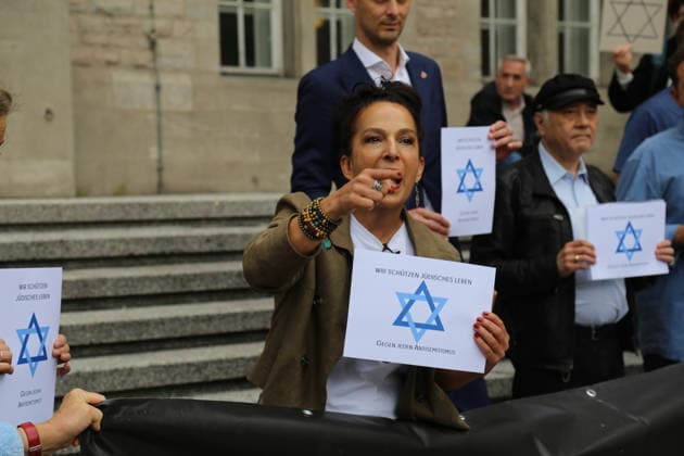 Berlin, Germany, September 17, 2026: District Mayor Martin Hikel and staff members of the Neukölln District Office participate in the Berlin Wears the Star of David campaign in front of Neukölln City Hall. Participants hold posters featuring the Star of David with the slogans We Protect Jewish Life, Against All Fo Copyright: xAlonxDavidx