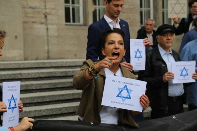 Berlin, Germany, September 17, 2026: District Mayor Martin Hikel and staff members of the Neukölln District Office participate in the Berlin Wears the Star of David campaign in front of Neukölln City Hall. Participants hold posters featuring the Star of David with the slogans We Protect Jewish Life, Against All Fo Copyright: xAlonxDavidx