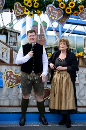 From left: Sebastian Willenborg, Gabriele Willenborg, Ferris wheel. Official press tour at the Oktoberfest (Wiesn), Munich, September 17, 2026