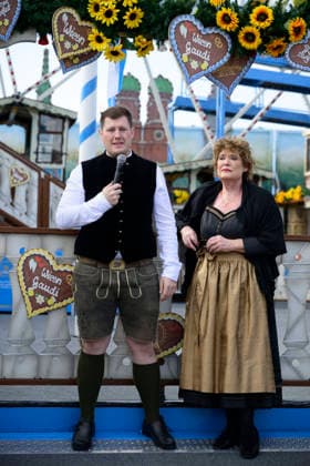From left: Sebastian Willenborg, Gabriele Willenborg, Ferris wheel. Official press tour at the Oktoberfest (Wiesn), Munich, September 17, 2026