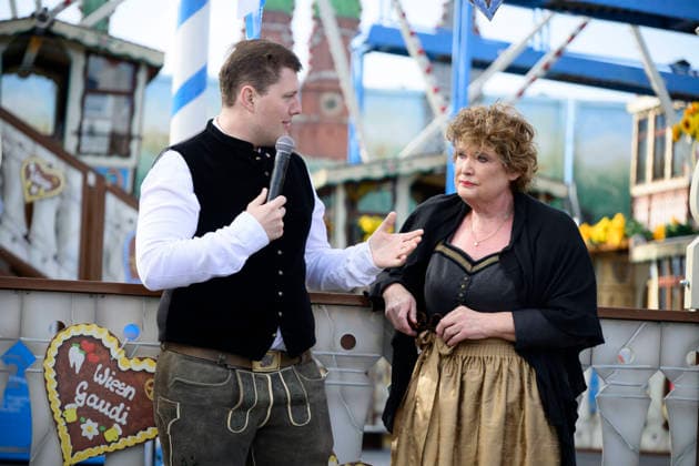 From left: Sebastian Willenborg, Gabriele Willenborg, Ferris wheel. Official press tour at the Oktoberfest (Wiesn), Munich, September 17, 2026