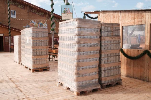 Freshly delivered stoneware beer mugs in front of a festival tent at the Oidn Wiesn. Official press tour at the Oktoberfest Wiesn, Munich, September 17, 2026