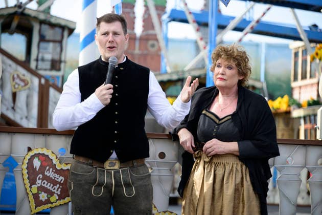 From left: Sebastian Willenborg, Gabriele Willenborg, Ferris wheel. Official press tour at the Oktoberfest (Wiesn), Munich, September 17, 2026
