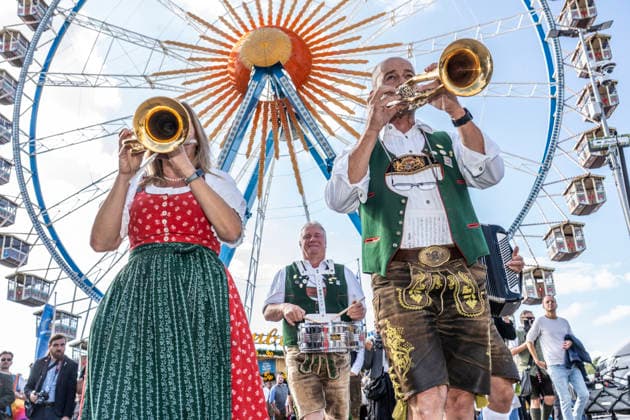 Wolfgang Grünbauer and the Munich Oktoberfest Musicians in front of the Ferris wheel, brass band music during the traditional press tour of the Wiesn, Munich, September 17, 2026 Germany, Munich, September 17, 2026, Oktoberfest 2026, Wolf