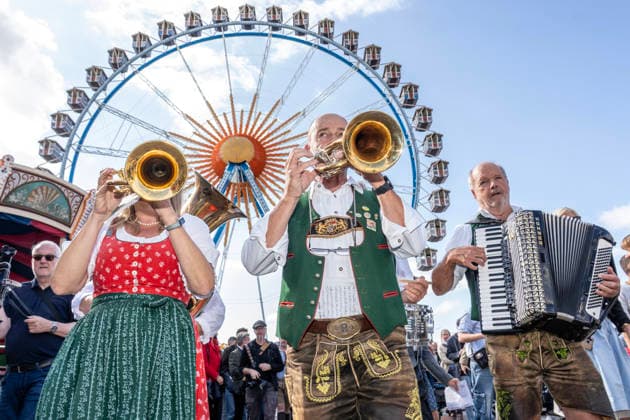 Wolfgang Grünbauer and the Munich Oktoberfest Musicians in front of the Ferris wheel, brass band music during the traditional press tour of the Wiesn, Munich, September 17, 2026 Germany, Munich, September 17, 2026, Oktoberfest 2026, Wolf