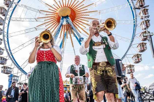Wolfgang Grünbauer and the Munich Oktoberfest Musicians in front of the Ferris wheel, brass band music during the traditional press tour of the Wiesn, Munich, September 17, 2026 Germany, Munich, September 17, 2026, Oktoberfest 2026, Wolf