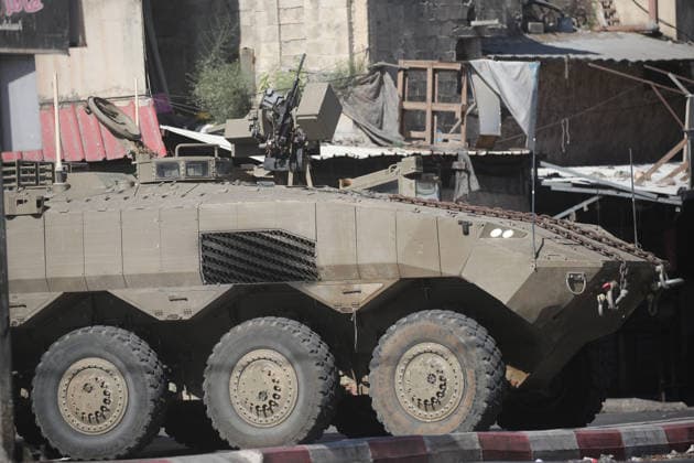 September 17, 2026, Nablus, Palestine: Armored Israeli military vehicle block the main road at the entrance to the Al-Ein refugee camp, west of Nablus in the West Bank, during an Israeli military operation to search for combat materials. Residents reported that the army raided and searched homes and arrested five people, and some people were injured after being severely beaten. Nablus Palestine - ZUMAs197 20260917_aaa_s197_036 Copyright: xNasserxishatyehx