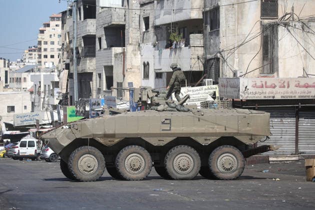 September 17, 2026, Nablus, Palestine: An Israeli soldier takes position atop an armored military vehicle during an Israeli military operation targeting residents of the Ein refugee camp, west of Nablus in the West Bank, to search for weaponry. Residents reported that the army raided and searched homes and arrested five people, and some people were injured after being severely beaten. Nablus Palestine  - ZUMAs197 20260917_aaa_s197_040 Copyright: xNasserxishatyehx
