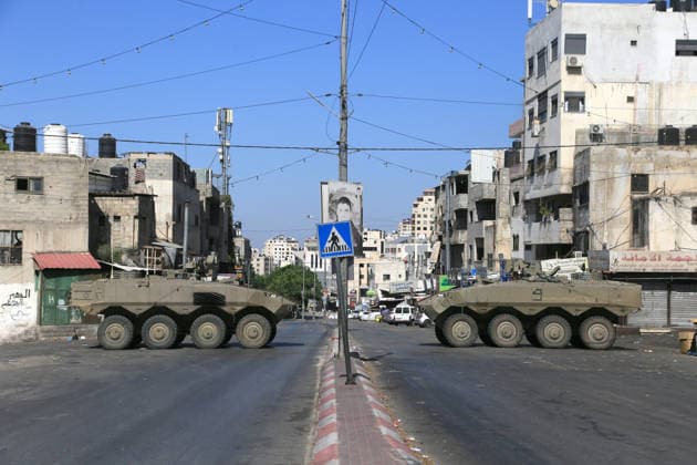 September 17, 2026, Nablus, Palestine: Armored Israeli military vehicles block the main road at the entrance to the Al-Ein refugee camp, west of Nablus in the West Bank, during an Israeli military operation to search for combat materials. Residents reported that the army raided and searched homes and arrested five people, and some people were injured after being severely beaten. Nablus Palestine  - ZUMAs197 20260917_aaa_s197_052 Copyright: xNasserxishatyehx