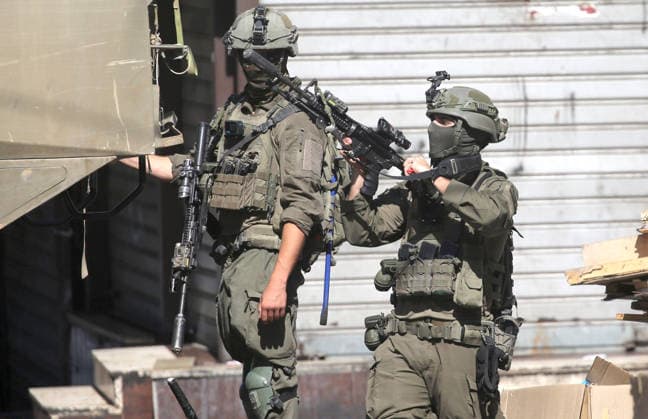 September 17, 2026, Nablus, Palestine: An Israeli soldier takes position during an Israeli military operation targeting residents of the Ein refugee camp, west of Nablus in the West Bank, to search for weapons. Residents reported that the army raided and searched homes and arrested five people, and some people were injured after being severely beaten. Nablus Palestine  - ZUMAs197 20260917_aaa_s197_055 Copyright: xNasserxishatyehx