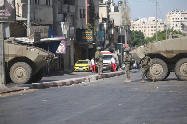 September 17, 2026, Nablus, Palestine: Armored Israeli military vehicles block the main road at the entrance to the Ein refugee camp, west of Nablus in the West Bank, during an Israeli military operation to search for weaponry. Residents reported that the army raided and searched homes and arrested five people, and some people were injured after being severely beaten. Nablus Palestine  - ZUMAs197 20260917_aaa_s197_060 Copyright: xNasserxishatyehx