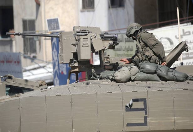 September 17, 2026, Nablus, Palestine: An Israeli soldier takes position atop an armored military vehicle during an Israeli military operation targeting residents of the Ein refugee camp, west of Nablus in the West Bank, to search for weaponry. Residents reported that the army raided and searched homes and arrested five people, and some people were injured after being severely beaten. Nablus Palestine - ZUMAs197 20260917_aaa_s197_048 Copyright: xNasserxishatyehx