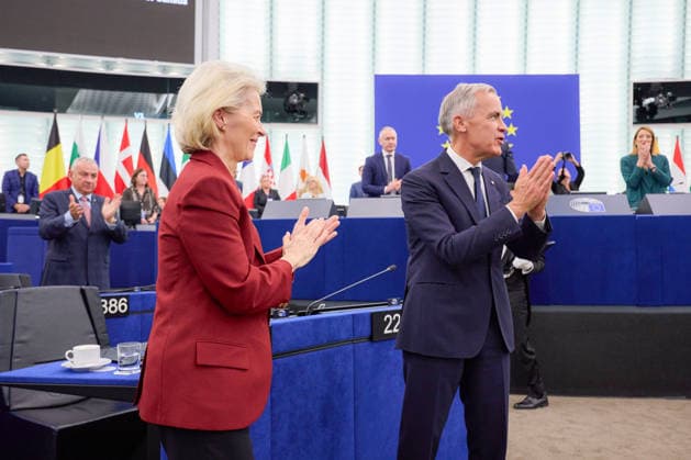 Canada s Prime Minister Mark Carney (R) acknowledges MEPs as European Commission President Ursula von der Leyen applauds after delivering a speech in the hemicycle at the European Parliament in Strasbourg, eastern France, on Thursday, September 17, 2026, during a visit in which he welcomed a proposal by European Commission President Ursula von der Leyen for Canada to become the European Union s first associate member. On the same day, Carney rejected threats made by U.S. President Donald Trump over Ottawa s efforts to strengthen its ties with the European Union.  FRN2026091703 EuropeanxUnion