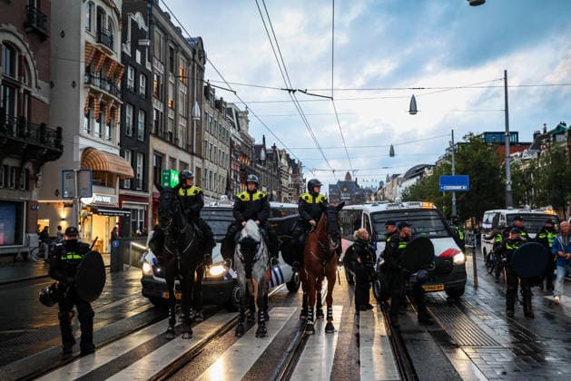 Pro-Palestinian demonstrators clash with police in Amsterdam AMSTERDAM, NETHERLANDS - SEPTEMBER 17: Pro-Palestinian demonstrators clash with police during a counter-protest against a pro-Israel event held at Dam Square in Amsterdam, Netherlands, on September 17, 2026. The counter-protest is relocated to Oude Turfmarkt after a court upholds the municipality s decision to prohibit the demonstration at Dam Square. Fadel Dawod Anadolu Amsterdam Netherlands. Editorial use only. Please get in touch for any other usage.  Copyright: x2026xAnadoluxFadelxDawodx