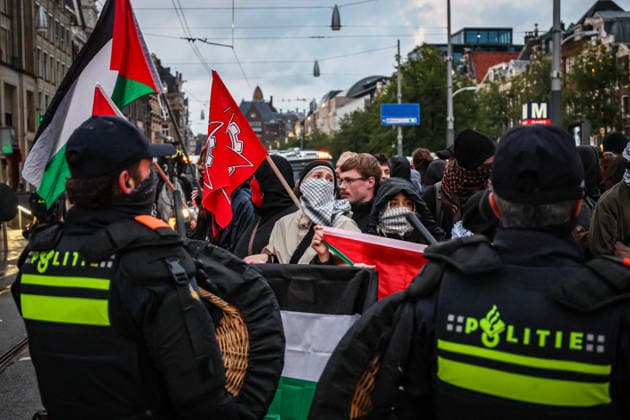Pro-Palestinian demonstrators clash with police in Amsterdam AMSTERDAM, NETHERLANDS - SEPTEMBER 17: Pro-Palestinian demonstrators clash with police during a counter-protest against a pro-Israel event held at Dam Square in Amsterdam, Netherlands, on September 17, 2026. The counter-protest is relocated to Oude Turfmarkt after a court upholds the municipality s decision to prohibit the demonstration at Dam Square. Fadel Dawod Anadolu Amsterdam Netherlands. Editorial use only. Please get in touch for any other usage.  Copyright: x2026xAnadoluxFadelxDawodx
