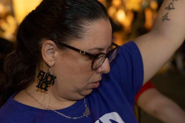 September 17, 2026: As attendees arrive for a New York Young Republican Club event with Greg Bovino, (not pictured) anti-ICE demonstrators stand outside holding signs and read the names of people who have died in Department of Homeland Security (DHS) custody or were killed by federal agents while acting as civilian rapid responders. A protester wears earrings that read FUCK ICE. Members of Rise and Resist denounce Bovino who led the Border Patrol and ICE occupation of Chicago and Minneapolis. - ZUMAr174 20260917_znp_r174_025 Copyright: xGinaxMxRandazzox