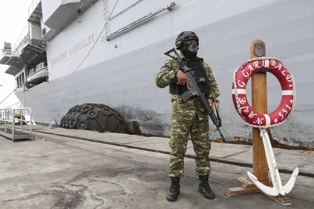 Indonesia s first aircraft carrier JAKARTA, INDONESIA - SEPTEMBER 18 : Armed soldier stand guard near the former Italian Navy aircraft carrier ITS Giuseppe Garibaldi at Pier 107 of Tanjung Priok port in Jakarta, Indonesia, on September 18, 2026. The through-deck aviation cruiser class ITS Giuseppe Garibaldi will be Indonesia’s first aircraft carrier, was donated by the Italian government to Indonesia and arrived after sailing for 25 days from Italy. Indonesia plans to use the vessel primarily for military operations other than war, including disaster response and humanitarian assistance, as part of efforts to strengthen and modernize the Indonesian Navy s integrated fleet weapons system. Agoes Rudianto Anadolu Jakarta Indonesia. Editorial  Copyright: x2026xAnadoluxAgoesxRudiantox