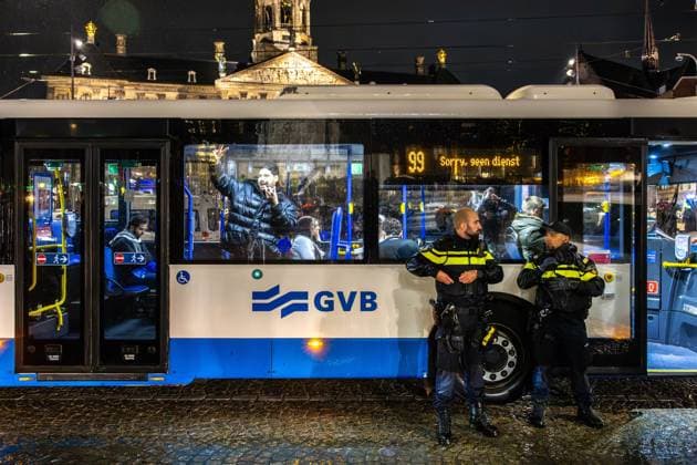 AMSTERDAM - Pro-Palestine demonstrators on a bus during a national rally on Dam Square organized by the working group Op de Bres voor IsraÃ«l together with other organizations. A counter-demonstration has also been announced. DINGENA MOL ANP netherlands out - belgium out  Copyright: xx x569092291x originalFilename: 569092291