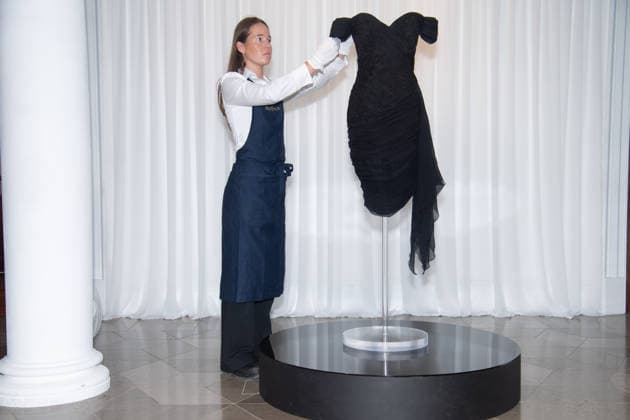 Sotheby s Princess Diana Revenge Dress Exhibition Preview at Sotheby s, London, UK - 18 September 2026 A technician holds Princess Diana s Revenge Dress by designer Christina Stambolian (est. £110k - £220k and $150k - $300k USD) as part of Sotheby s Princess Diana Revenge Dress Exhibition Preview which is to go on exhibition from 18th - 24th September 2026 before being offered at auction in New York on 9th December 2026 at Sotheby s, London, England, UK on Friday 18 September, 2026., Credit:Justin Ng Avalon UK, England, London, Sotheby s Copyright: xJustinxNgx xAvalonx 1136010851