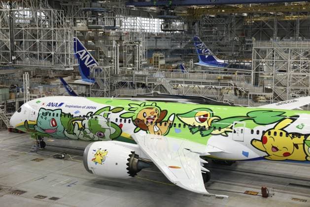Pokemon-themed ANA plane Photo taken at Tokyo s Haneda airport on Sept. 18, 2026, shows an All Nippon Airways special plane featuring Pokemon characters, unveiled to the media to mark the 30th anniversary of the start of the popular Pokemon video game series.  A14AA0005627812P