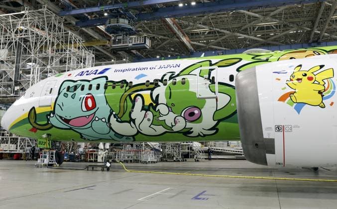 Pokemon-themed ANA plane Photo taken at Tokyo s Haneda airport on Sept. 18, 2026, shows an All Nippon Airways special plane featuring Pokemon characters, unveiled to the media to mark the 30th anniversary of the start of the popular Pokemon video game series.  A14AA0005627814P