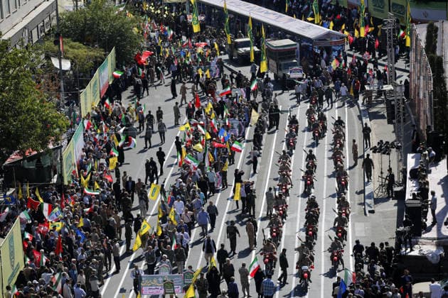 Armed volunteers march through central Tehran in Basij-led mobilization rally TEHRAN, IRAN - SEPTEMBER 18: (RESTRICTIONS: No Access Israel Media Persian Language TV Stations Outside Iran Strictly No Access BBC Persian VOA Persian Manoto TV Iran International TV) Armed volunteers registered with the Janfada-ye Iran program march between Imam Hossein Square and Enqelab Square in Tehran, Iran on September 18, 2026. Led by the Basij paramilitary force affiliated with the Islamic Revolutionary Guard Corps (IRGC), demonstrators carrying automatic rifles and long-barrel weapons took to the streets to demonstrate wartime mobilization and national defense readiness following recent US and Israeli strikes. Fatemeh Bahrami Anadolu Tehran Iran. Ed  Copyright: x2026xAnadoluxFatemehxBahramix