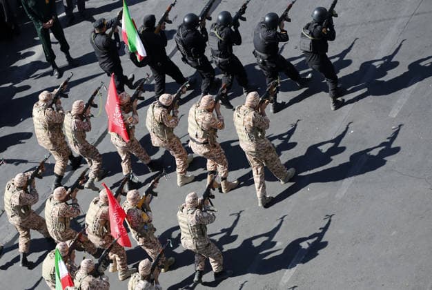 Armed volunteers march through central Tehran in Basij-led mobilization rally TEHRAN, IRAN - SEPTEMBER 18: (RESTRICTIONS: No Access Israel Media Persian Language TV Stations Outside Iran Strictly No Access BBC Persian VOA Persian Manoto TV Iran International TV) Armed volunteers registered with the Janfada-ye Iran program march between Imam Hossein Square and Enqelab Square in Tehran, Iran on September 18, 2026. Led by the Basij paramilitary force affiliated with the Islamic Revolutionary Guard Corps (IRGC), demonstrators carrying automatic rifles and long-barrel weapons took to the streets to demonstrate wartime mobilization and national defense readiness following recent US and Israeli strikes. Fatemeh Bahrami Anadolu Tehran Iran. Ed  Copyright: x2026xAnadoluxFatemehxBahramix